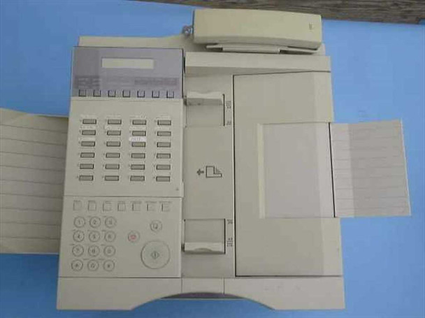 Canon Laser Class 5500 fax machine – top-down view showing full control panel with LCD display, one-touch dial keys, numeric keypad, and document feeder platen