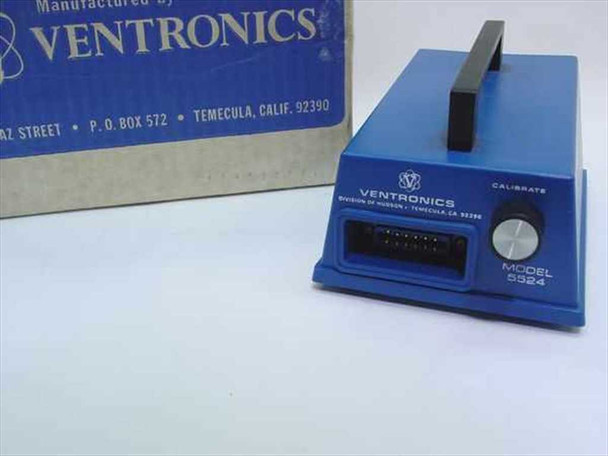 Ventronics 5524 Oxygen Analyzer side view showing ribbon connector port and Calibrate knob, with model label