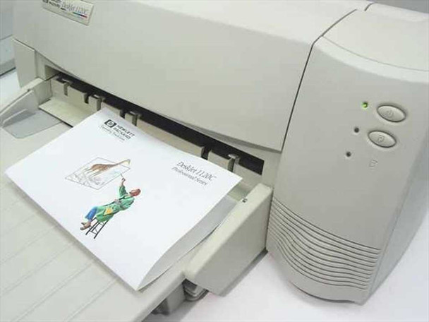 HP DeskJet 1120C – right-side angle view showing power/resume buttons with green LED indicator and paper in output tray