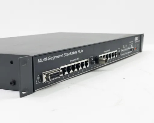SMC TigerStack 3312TC — front-right angle view showing Segment A and Segment B RJ45 port groups and CSM uplink connector