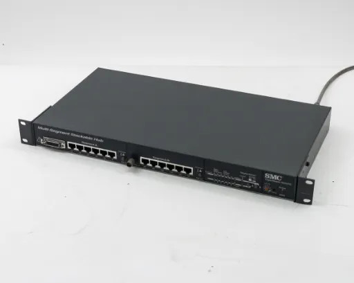 SMC TigerStack 3312TC 12-port 10Base-T rackmount hub — front-left angle view showing front panel ports and SMC logo