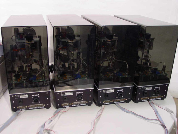 Lotus Technologies 7100 CSS modules – rear view of all four units showing STRAIN, CONTROL/POWER, and MOTOR connector ports on each module's lower panel