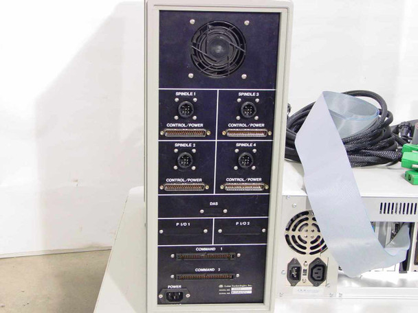 Lotus Technologies 7000 tower controller – rear panel showing Spindle 1-4 Control/Power ports, DAS connector, P/I/O 1 and 2, Command 1 and 2 ports, and IEC power inlet