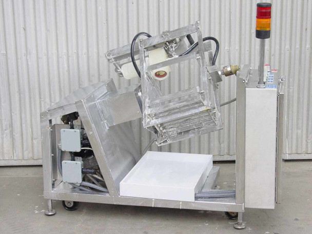 GE Fanuc IC620MDR028A Bodine FPM liquid chemical mixing station – full right-side view showing tilted mixing frame, removable white tray, stainless steel body, and alarm tower light