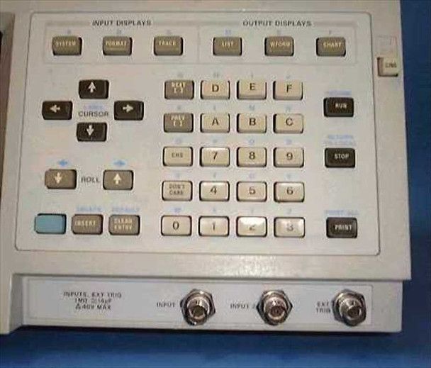 HP 1631D Logic Analyzer close-up of front panel keypad with INPUT/OUTPUT DISPLAY keys, cursor controls, BNC oscilloscope inputs, and EXT TRIG connector