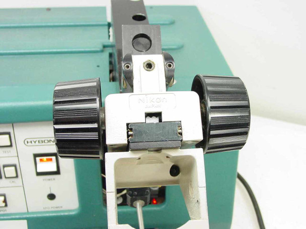 HyBond 512-10-41 close-up of Nikon optics mount and transducer head assembly with dual focus knobs and bond tip visible