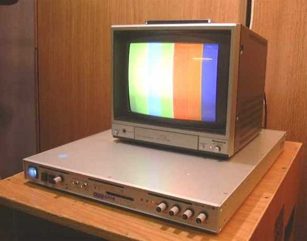 Nova 620S TBC rackmount unit with Panasonic monitor on top showing color bars output