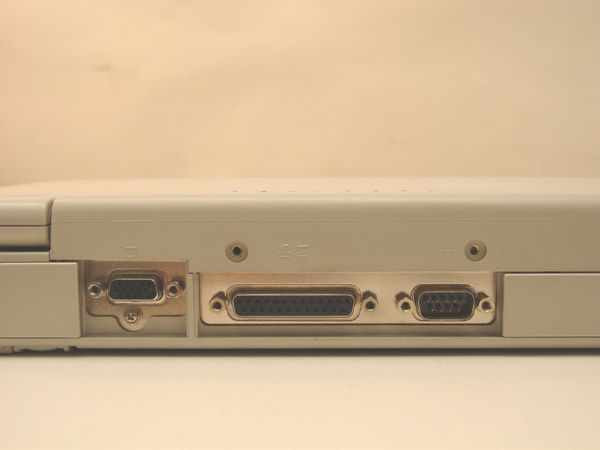 Toshiba Satellite T1960CT/320 rear port panel showing VGA, parallel DB25, and serial DB9 connectors