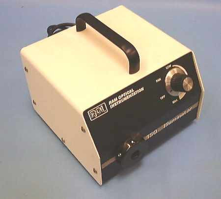 Ram Optical Instrumentation ROI 150 Fiberoptic Illuminator – front and right-side view showing ROI logo, model label, carry handle, fiber optic port, and variable intensity rotary control knob