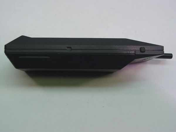 NEC MP5A1A3-1A cell phone – right side profile view showing side switch and battery door edge