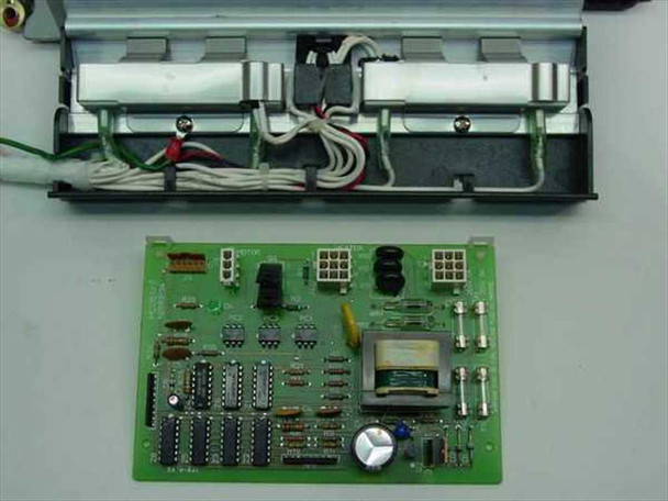 Close-up of Dataproducts Jolt heater strip assembly with fluorescent lamps and wiring harness, alongside the green PCB control board showing ICs and transformer
