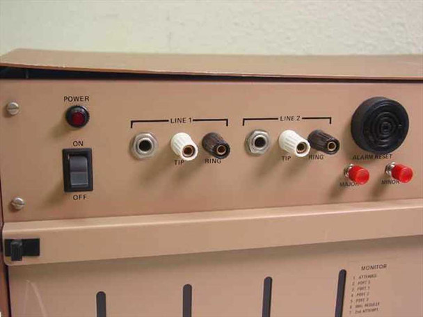 CMC Alarm-Matic System 4000 front panel close-up showing Power switch, Line 1 and Line 2 Tip/Ring terminals, audible horn, and Major/Minor alarm indicator lamps
