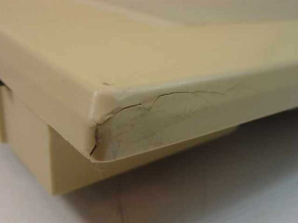 Summagraphics SummaSketch III — close-up of cracked and broken plastic at one corner of the tablet housing