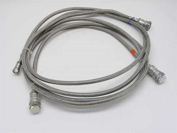 Pair of Anaconda 5400-S5-8 cryogenic helium compressor flex lines coiled together, stainless steel braided jacket with quick-disconnect couplings visible at both ends