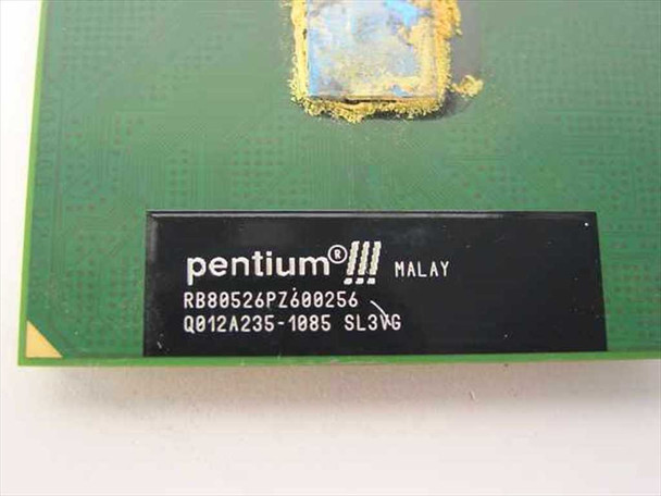 Intel Pentium III SL3VG CPU label closeup showing OPN RB80526PZ600256 and S-spec SL3VG