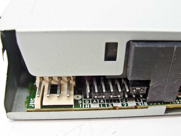 Epson SMD-300 floppy drive — bottom PCB closeup showing jumper block array with labeled positions (G, A, H, I, S, and numbered positions)
