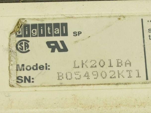 Digital Equipment LK201BA bottom label showing model number LK201BA, serial number B054902KT1, and DEC logo with CSA/UL marks