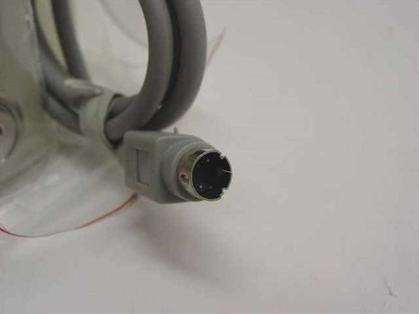 Mini-DIN (ADB) connector on MAC Guardian security cable — close-up of cable end