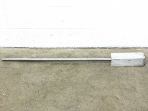 Thomson RoundRail 1-inch stainless steel linear guide rod with aluminum bearing block – full length side view on floor