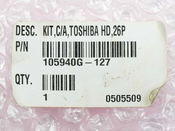 Zebra 105940G-127 part label showing description KIT C/A TOSHIBA HD 26P, part number barcode, and quantity 1