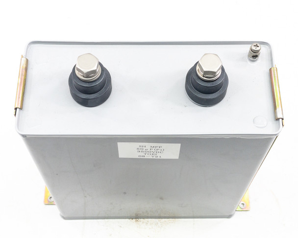 TOEI 08-Y21 high voltage capacitor – top-down view showing dual stud terminals and rubber insulating bushings