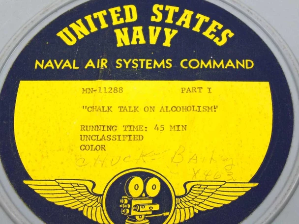 Close-up of US Navy Naval Air Systems Command MN-11288 label reading Chalk Talk on Alcoholism Part I, Running Time 45 Min, Unclassified, Color