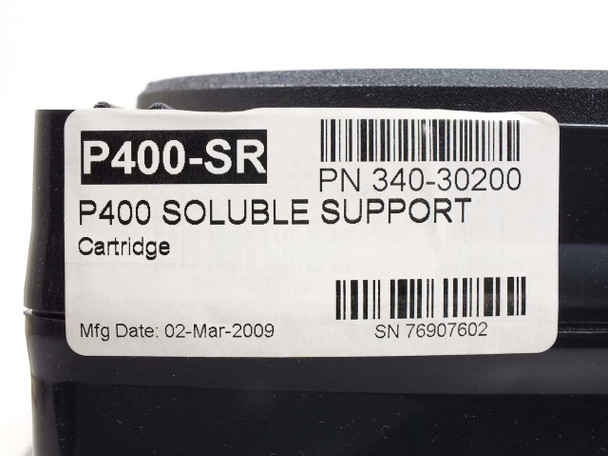 Close-up of Stratasys P400-SR cartridge label showing model P400-SR, PN 340-30200, P400 Soluble Support Cartridge, Mfg Date 02-Mar-2009