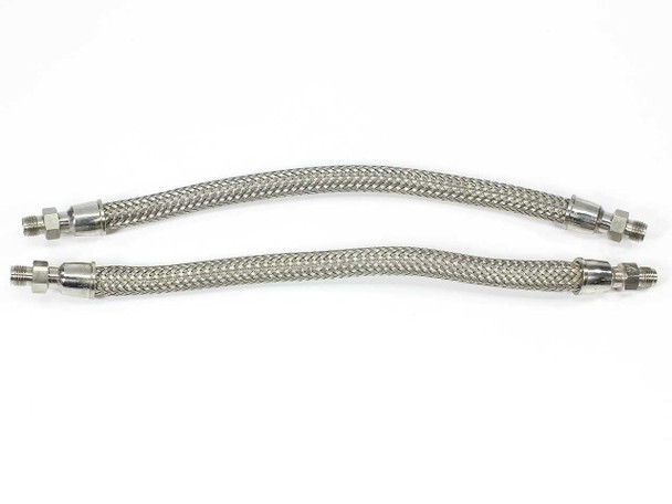 Swagelok SS-FM4PM2PM2-12 FM Series pair of two 12-inch stainless braided hoses laid side by side on white background