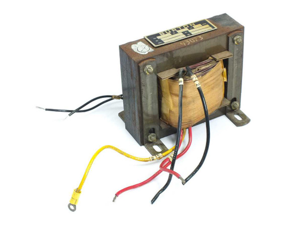 Burton 15180 multi-tap AC transformer — three-quarter front view showing wire leads (black, red, yellow) and open frame chassis with exposed laminated core and coil