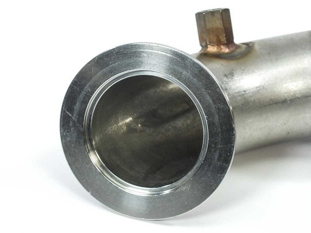 Front-on view into the bore of one DN50KF flange showing 52mm inner diameter opening and feedthrough stub visible at top