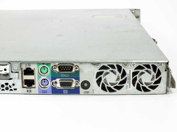 Compaq ProLiant DL320 rear panel right-side close-up showing dual PS/2 ports, DB-9 serial port, VGA port, UID port, and exhaust fan