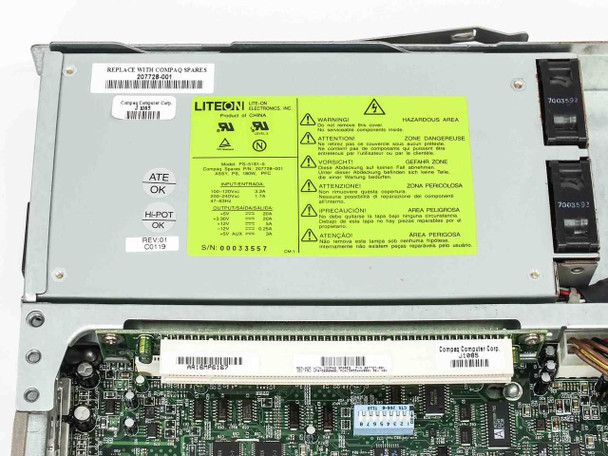 Compaq ProLiant DL320 internal Lite-On power supply label showing model PS-5141-9, Compaq part 207738-001, and voltage ratings