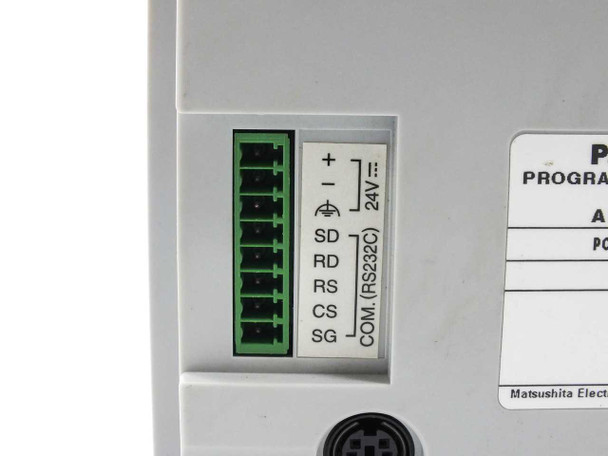 AIGT2230H rear connector block closeup showing RS232C screw terminals labeled SD, RD, RS, CS, SG and 24V power terminals