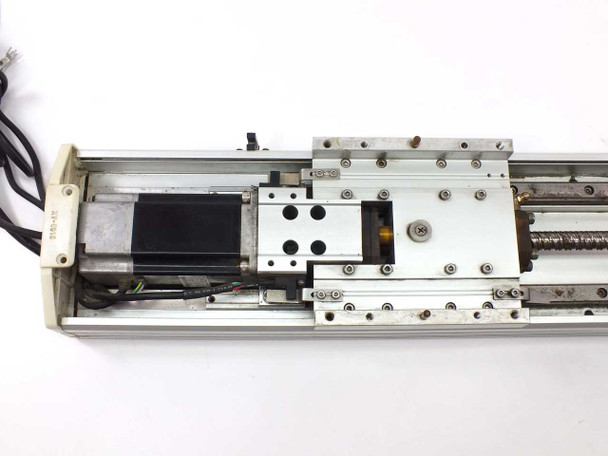 Taiyo XY-5015 linear actuator viewed from above without cover — showing carriage, linear guide rails, and motor cable routing