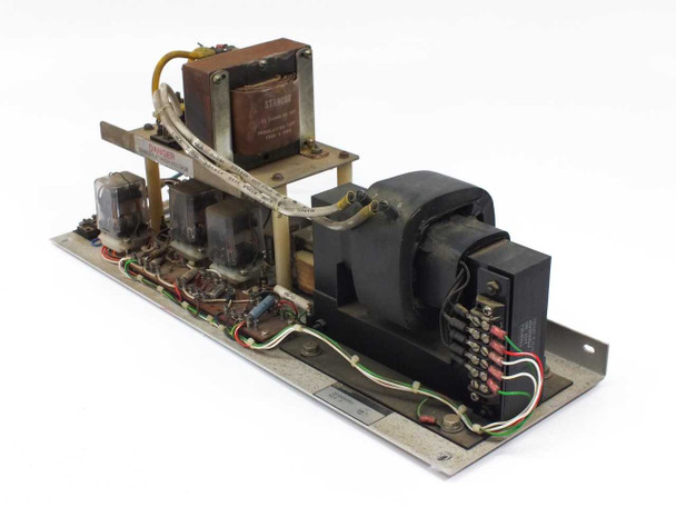 Varian CMC 1527A High Voltage Power Assembly – three-quarter view showing large HV transformer, Stancor transformer, relays, and wiring on aluminum chassis