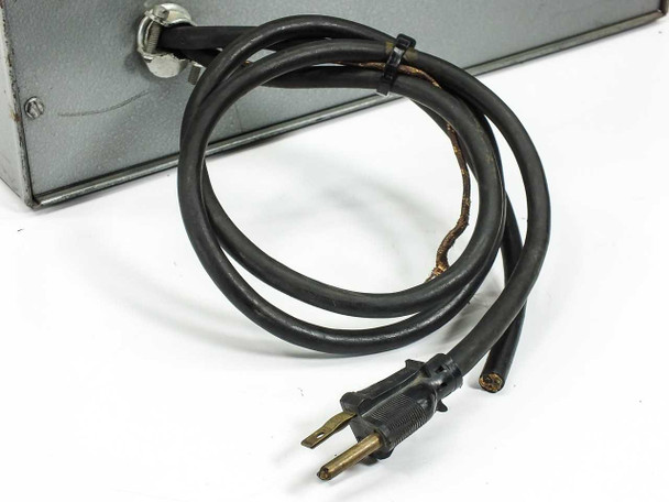 Close-up of AC power cord attached to rear of Temp-Tendor 428-8171R1 showing cord insulation wear and 2-prong plug