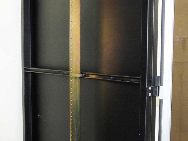 Rackmount cabinet interior detail – adjustable gold zinc vertical rack rails with punched mounting holes and horizontal cable management bar