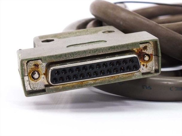 Data cable 25-pin D-sub female connector end showing corrosion on connector shell and metal housing