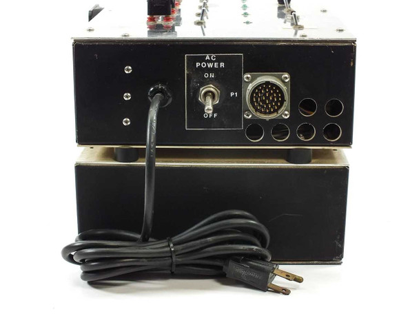 Rockwell Display Module Supply Controller side panel showing AC POWER toggle switch ON/OFF, multi-pin circular connector P1, and ventilation holes
