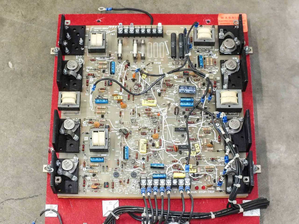 Volkmann AD-1 drive board 20001BBG1M1021 close-up overhead view showing main PCB with transformers, capacitors, power transistors, and terminal blocks on red panel