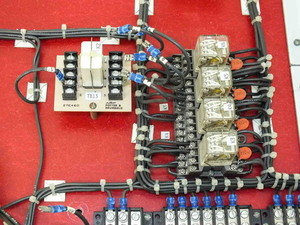Volkmann drive panel relay section showing Potter & Brumfield terminal block TB13 and three Eagle Signal 17P4C AC120V relays with orange indicator tabs and blue wire terminations