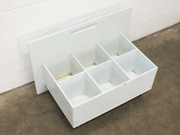 Top-down angled view of 6-section acid bath interior with lid slid back – corrosion residue visible on interior seams