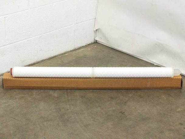 High Purity FCWN540S2780 40-inch filter cartridge resting in opened original box on concrete floor