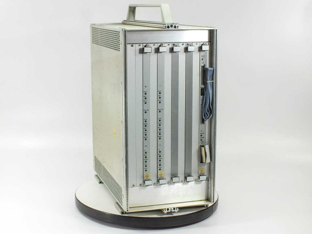Zycad XP-140 right side open view showing full card cage with 3 installed boards, ribbon cable, and carry handle