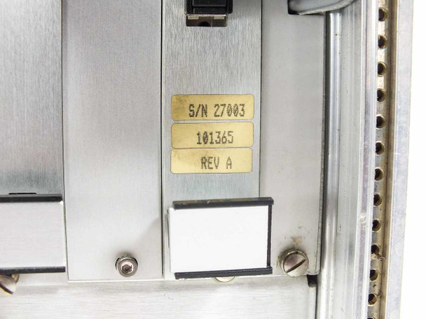 Zycad XP-140 card slot label showing S/N 27003, part number 101365, REV A on gold adhesive label