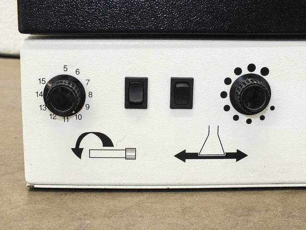 Hybaid MAXI 14 front panel close-up – carousel speed dial (5–15 RPM), two rocker switches, and orbital/linear shaking mode knob with icons