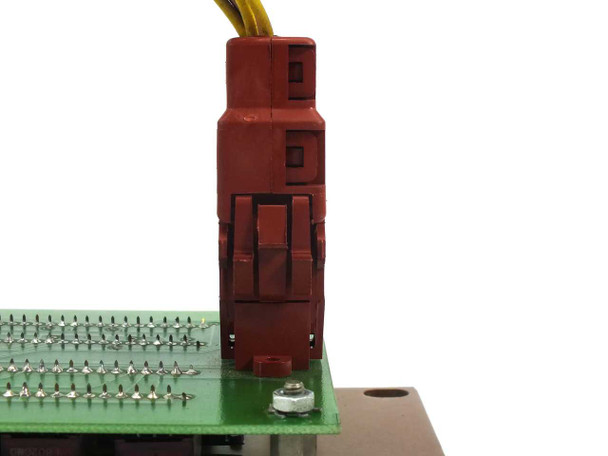 Close-up of red keyed ribbon/card-edge connector on rear of Drytek 2800042 display board with harness wires