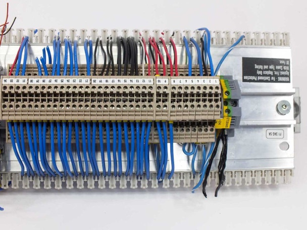 Top view of ME Euro W 2.5/35 three-stack terminal blocks section with numbered label strip and blue wiring