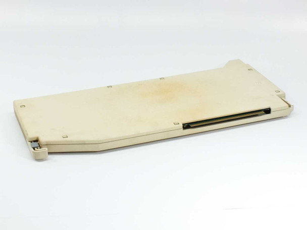 Lucent 517L33A Merlin Legend Processor Module – angled top view showing cream-colored housing and backplane edge connector