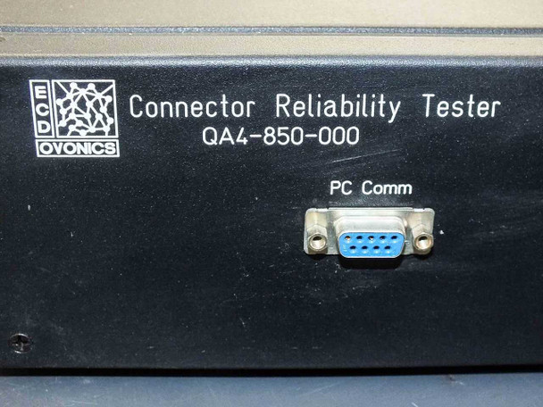 ECD Ovonics QA4-850-000 rear panel — PC Comm DB-9 serial port labeled, black enclosure
